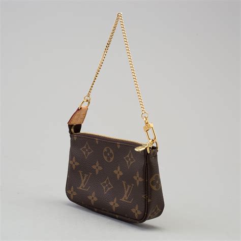 lv tasche mit goldkette